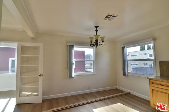 a view of room with a ceiling fan