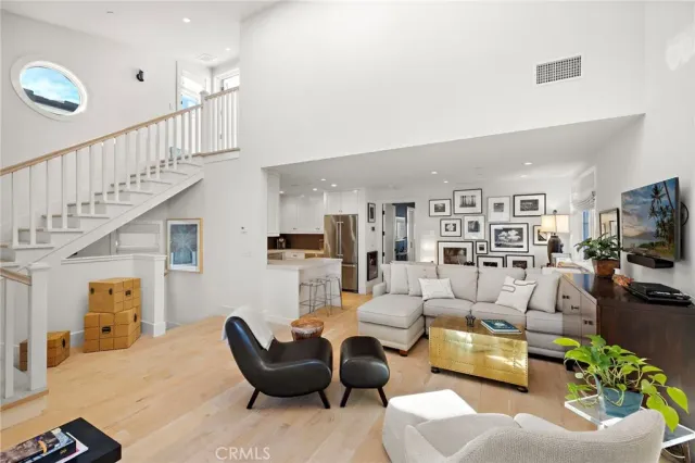 a view of a dining room with furniture and a window