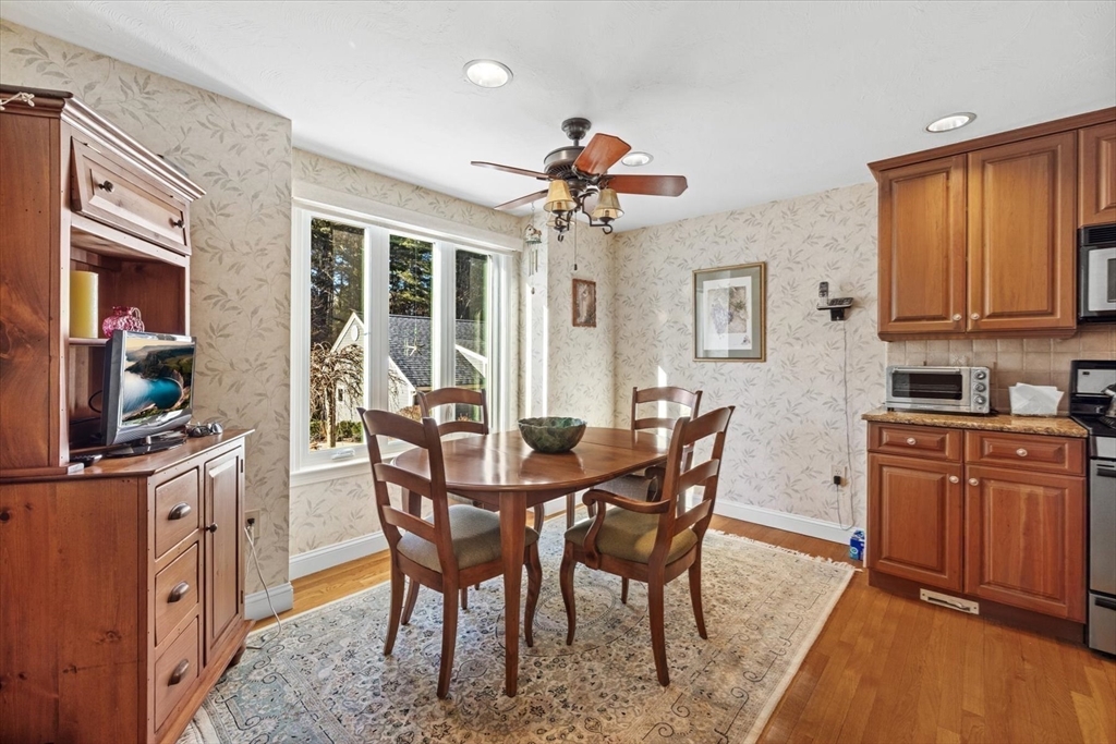 55 Bay Farm Road, Unit 55 Duxbury, MA 02332 - Photo 13 of 37 a view of a dining room with furniture window and wooden floor