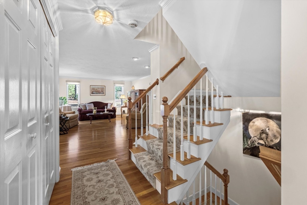 55 Bay Farm Road, Unit 55 Duxbury, MA 02332 - Photo 15 of 37 a view of livingroom and dining room with wooden floor