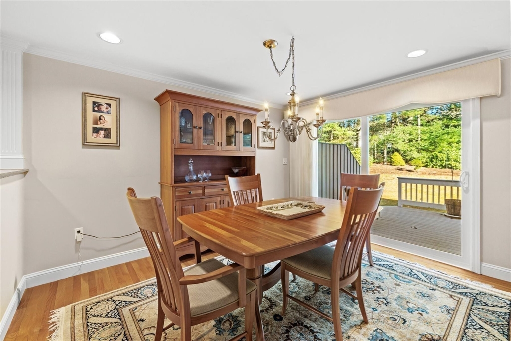 55 Bay Farm Road, Unit 55 Duxbury, MA 02332 - Photo 2 of 37 a view of a dining room with furniture window and wooden floor