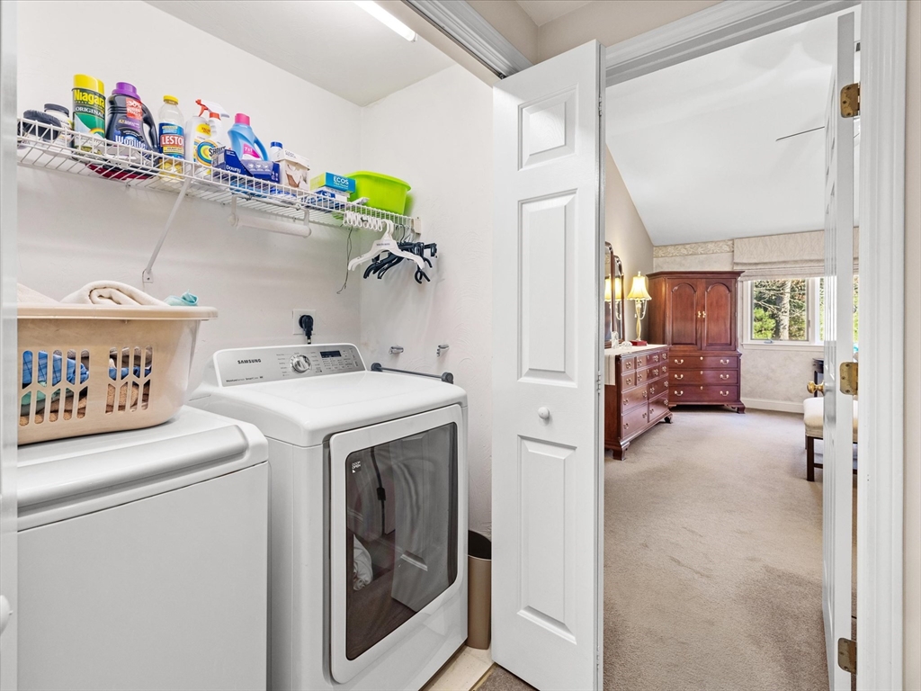55 Bay Farm Road, Unit 55 Duxbury, MA 02332 - Photo 21 of 37 a view of washer and dryer in a utility room