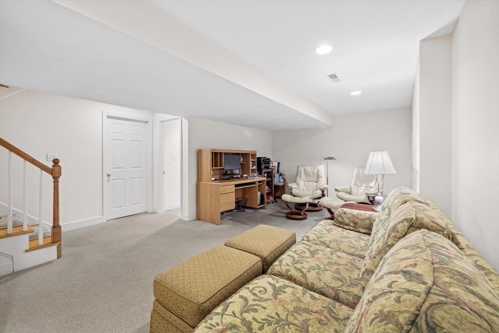 55 Bay Farm Road, Unit 55 Duxbury, MA 02332 - Photo 25 of 37 a bed room with a bed and a tv