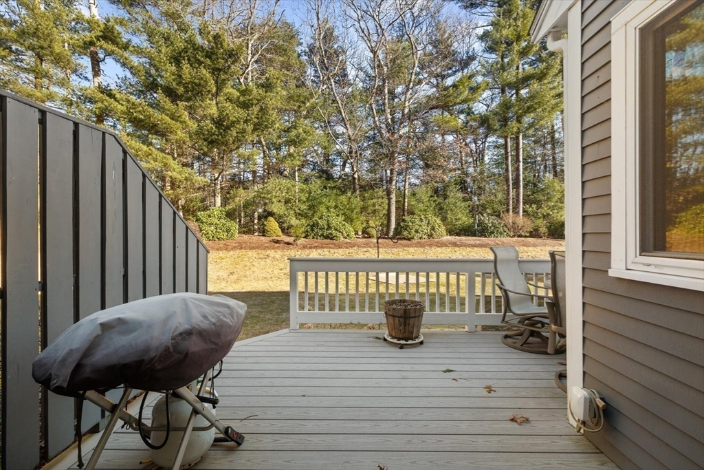 55 Bay Farm Road, Unit 55 Duxbury, MA 02332 - Photo 32 of 37 a view of balcony with wooden floor and outdoor seating