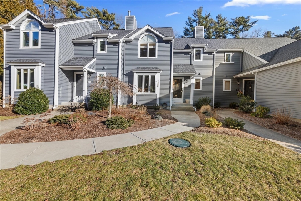 55 Bay Farm Road, Unit 55 Duxbury, MA 02332 - Photo 33 of 37 front view of a house with a yard