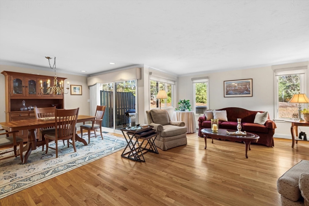 55 Bay Farm Road, Unit 55 Duxbury, MA 02332 - Photo 8 of 37 a living room with furniture and wooden floor