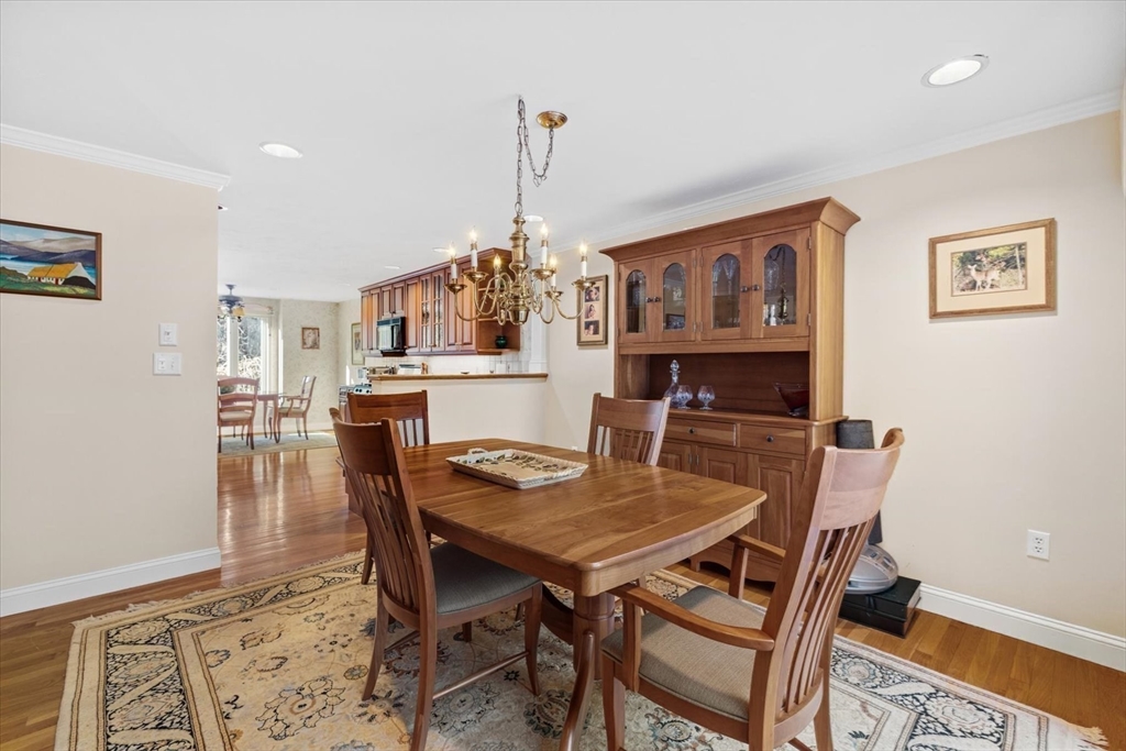 55 Bay Farm Road, Unit 55 Duxbury, MA 02332 - Photo 10 of 37 a view of a dining room with furniture window and wooden floor
