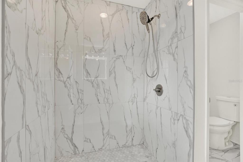 1712 Elk Spring Drive Brandon, FL 33511 - Photo 17 of 21 a bathroom with a shower