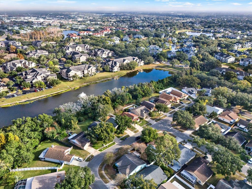 1712 Elk Spring Drive Brandon, FL 33511 - Photo 20 of 21 an aerial view of residential houses with outdoor space