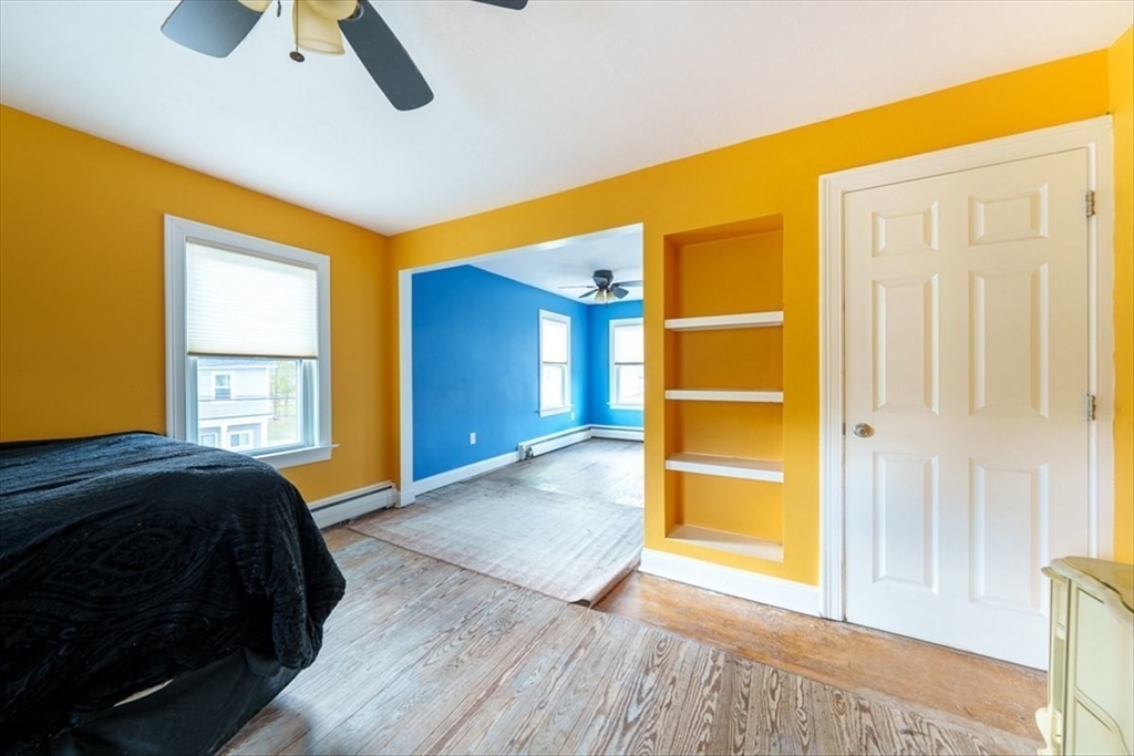 95 Lake Street Webster, MA 01570 - Photo 18 of 40 a bedroom with a bed and a window