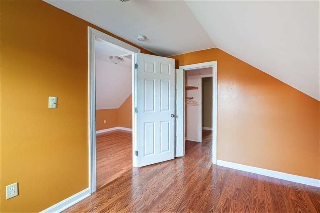 95 Lake Street Webster, MA 01570 - Photo 32 of 40 a view of a hallway with wooden floor