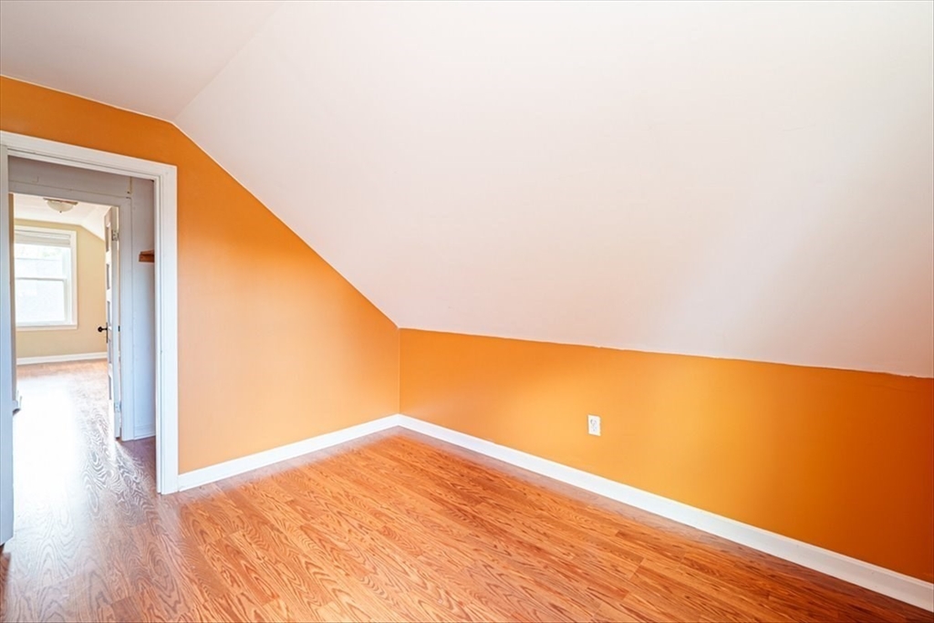 95 Lake Street Webster, MA 01570 - Photo 34 of 40 a view of empty room with wooden floor