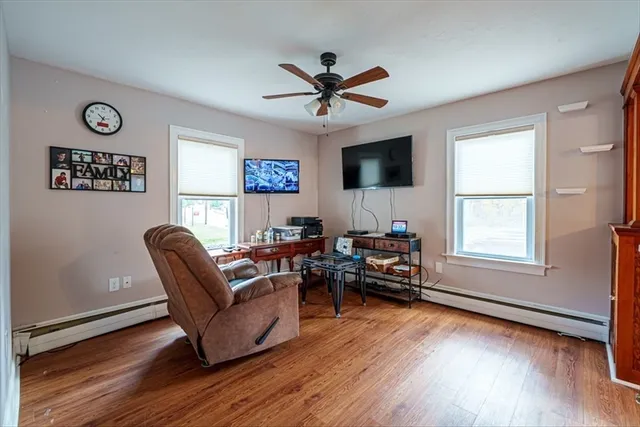 a living room with furniture and a window