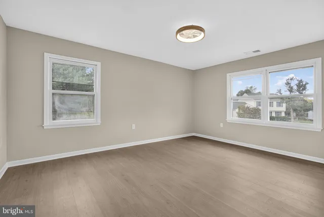 an empty room with windows