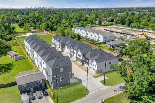 an aerial view of a house with a garden