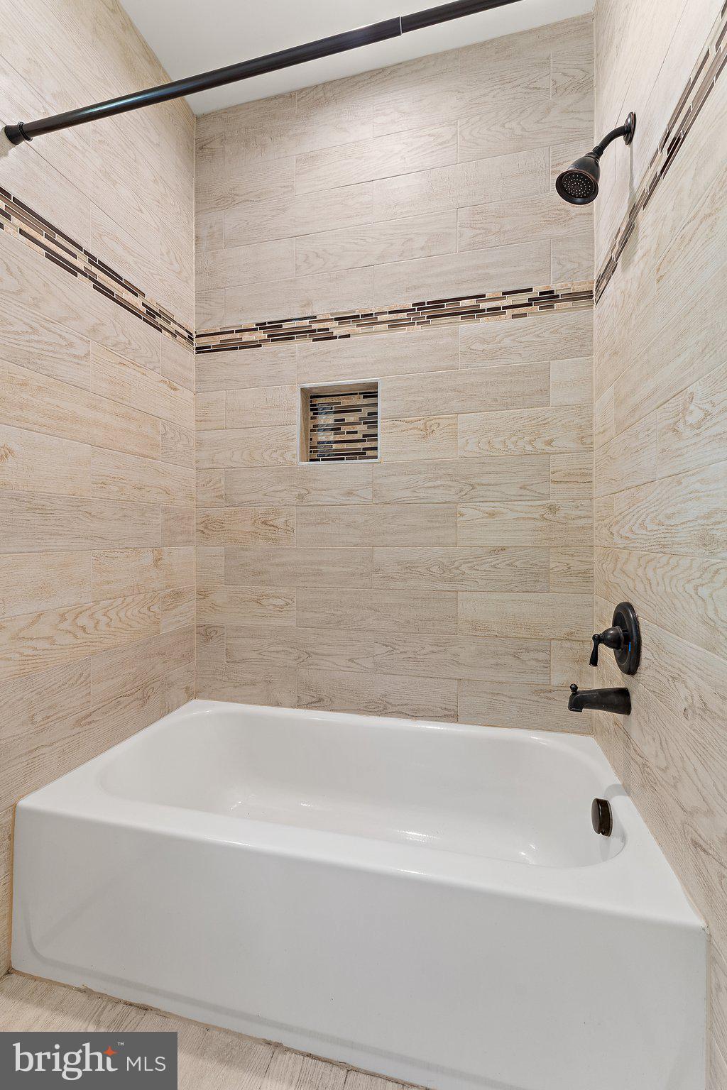 5946 Wilson Road Marshall, VA 20115 - Photo 39 of 45 Primary Bath Tile Shower Surround