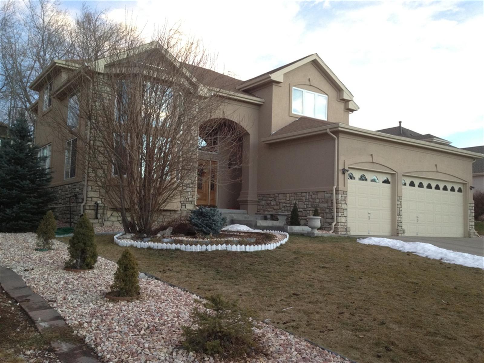 7482 Routt Lane Arvada, CO 80005 - Photo 1 of 1 a front view of a house with entertaining space
