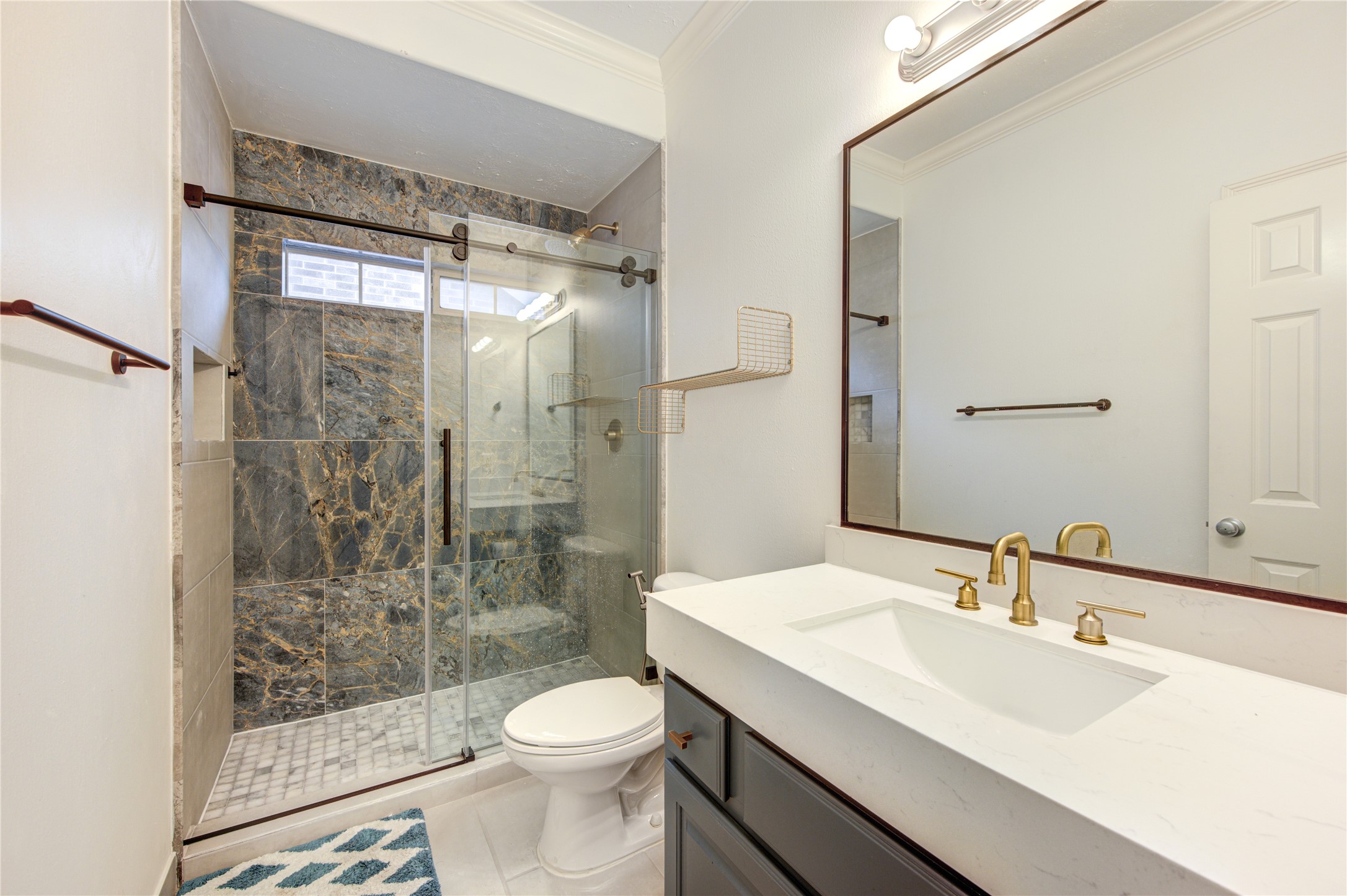 1131 Sopris Drive Houston, TX 77077 - Photo 28 of 35 a bathroom with a sink toilet and shower