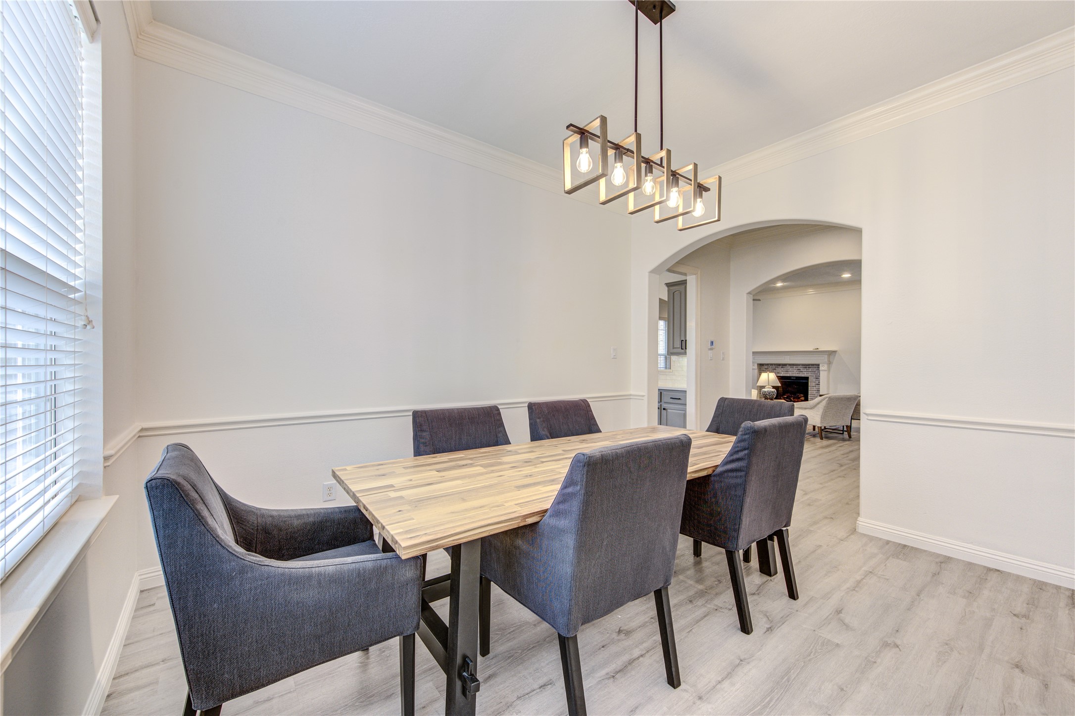 1131 Sopris Drive Houston, TX 77077 - Photo 3 of 35 a view of a dining room with furniture and wooden floor