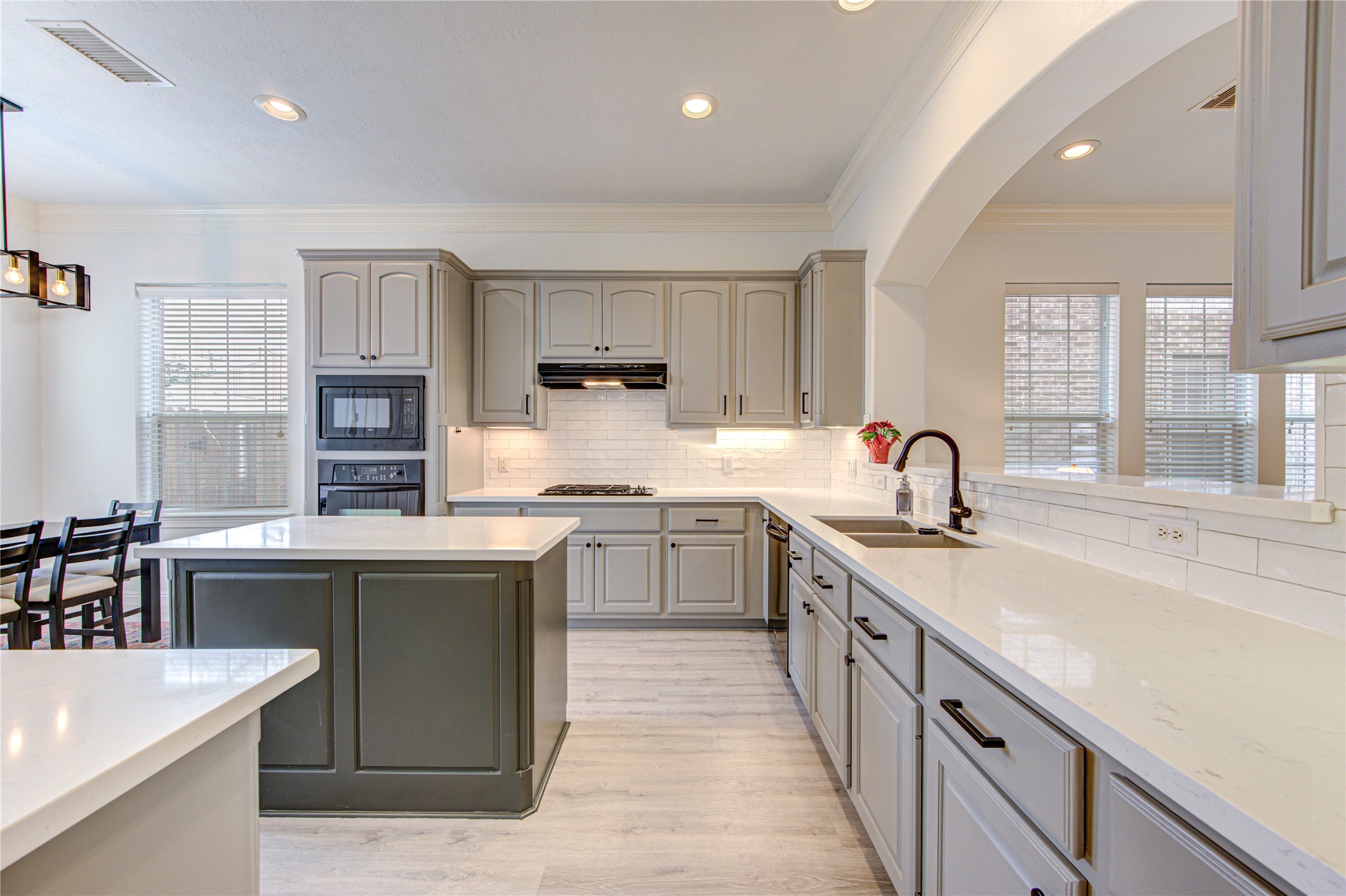 1131 Sopris Drive Houston, TX 77077 - Photo 10 of 35 a kitchen with stainless steel appliances granite countertop a sink stove and refrigerator
