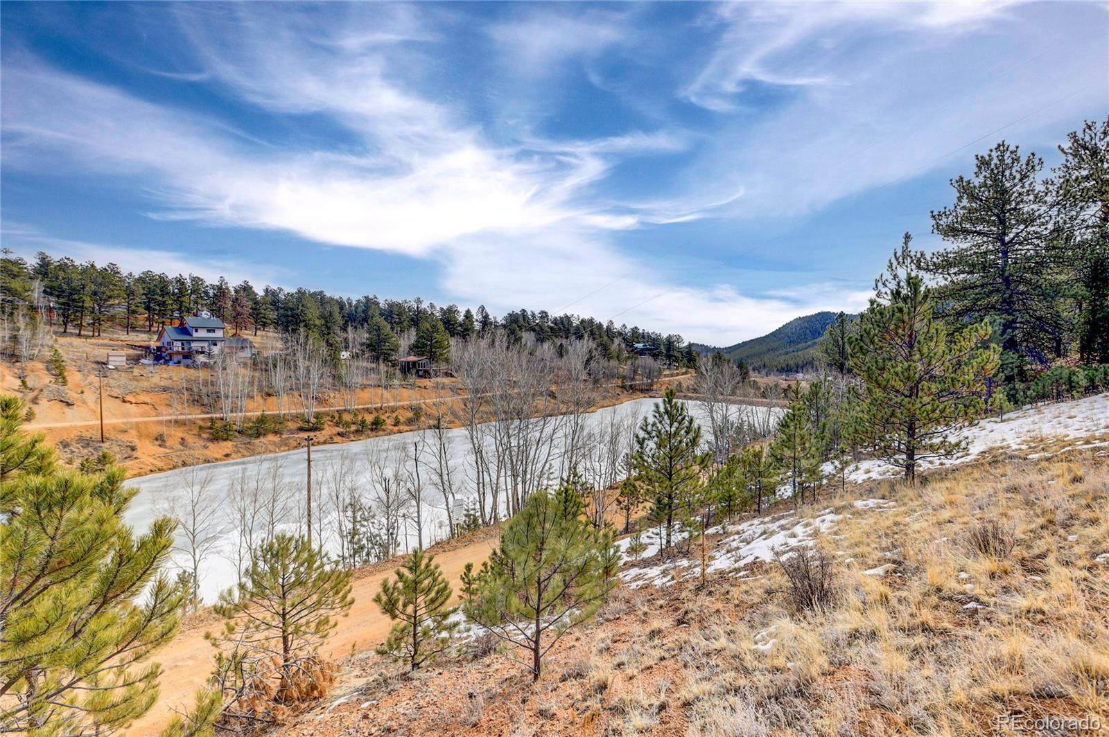 147 Ward Street Bailey, CO 80421 - Photo 10 of 15 a view of a lake with a city