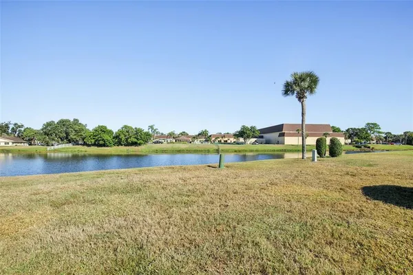 an aerial view of a house with a ocean view