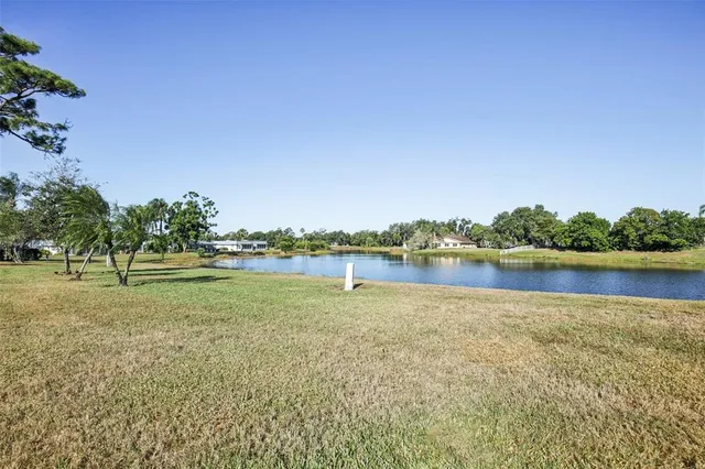 an aerial view of a house with a ocean view