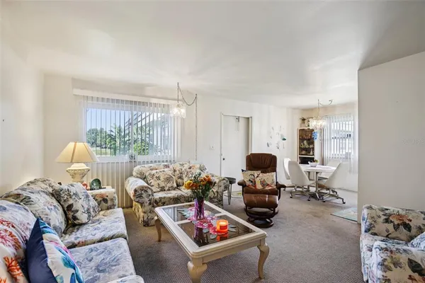 a bed room with bed and a window