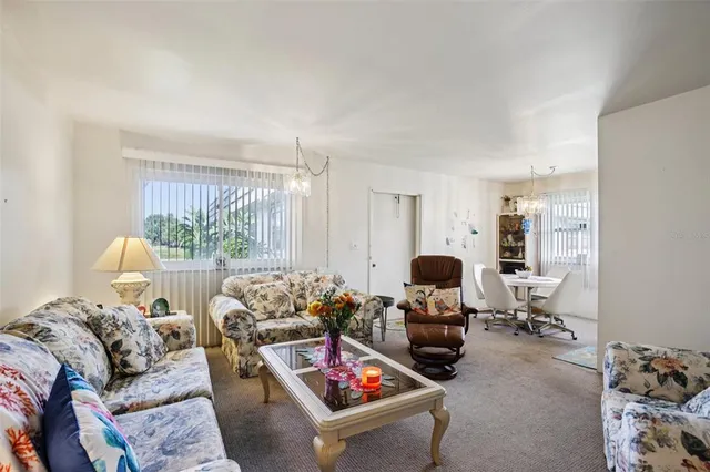 a bed room with bed and a window