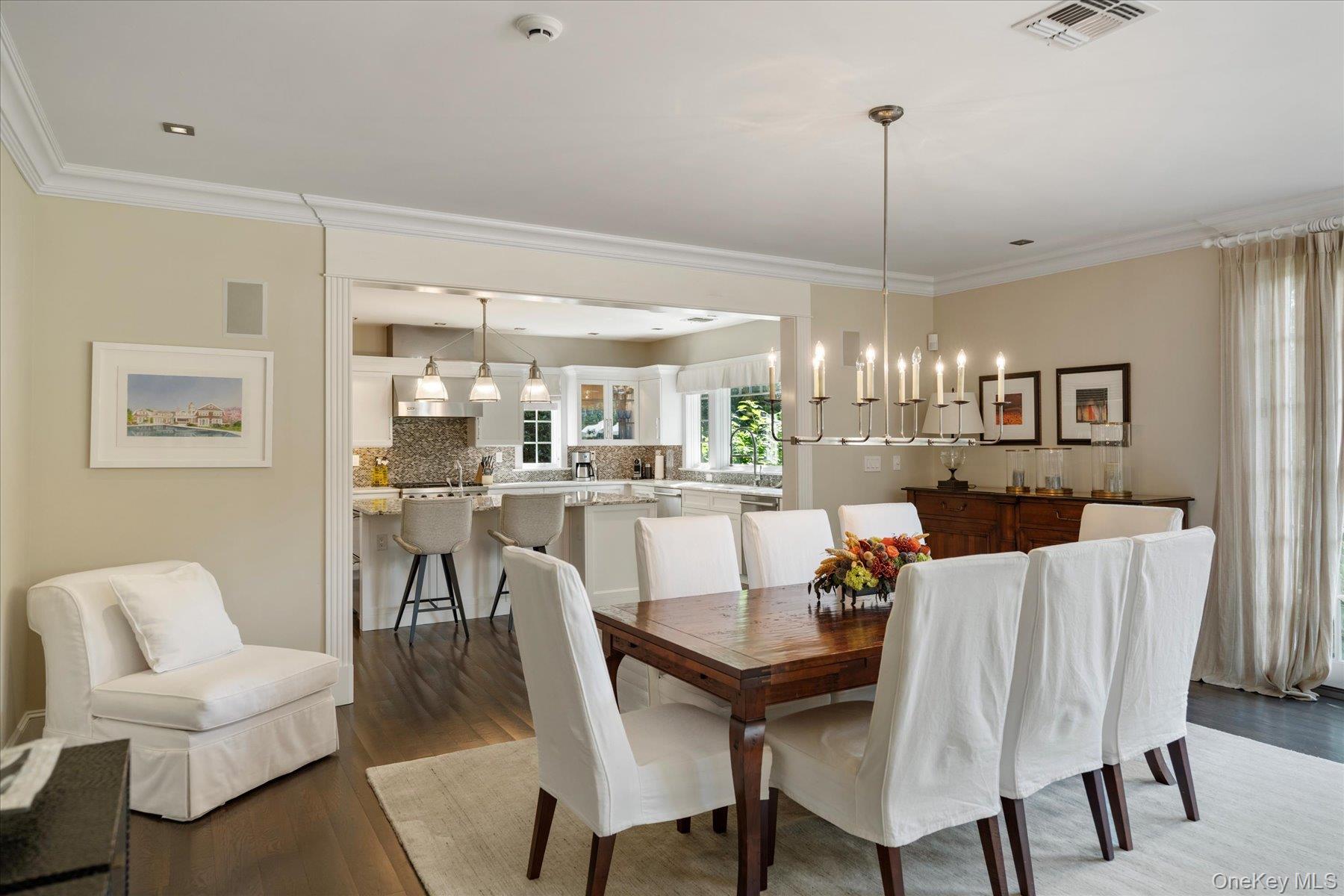 231 Flying Point Road Southampton, NY 11968 - Photo 12 of 34 a view of a dining room and livingroom furniture and a chandelier