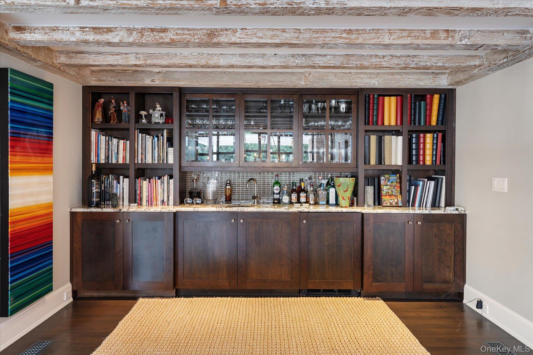 231 Flying Point Road Southampton, NY 11968 - Photo 8 of 34 a bed with a book shelf