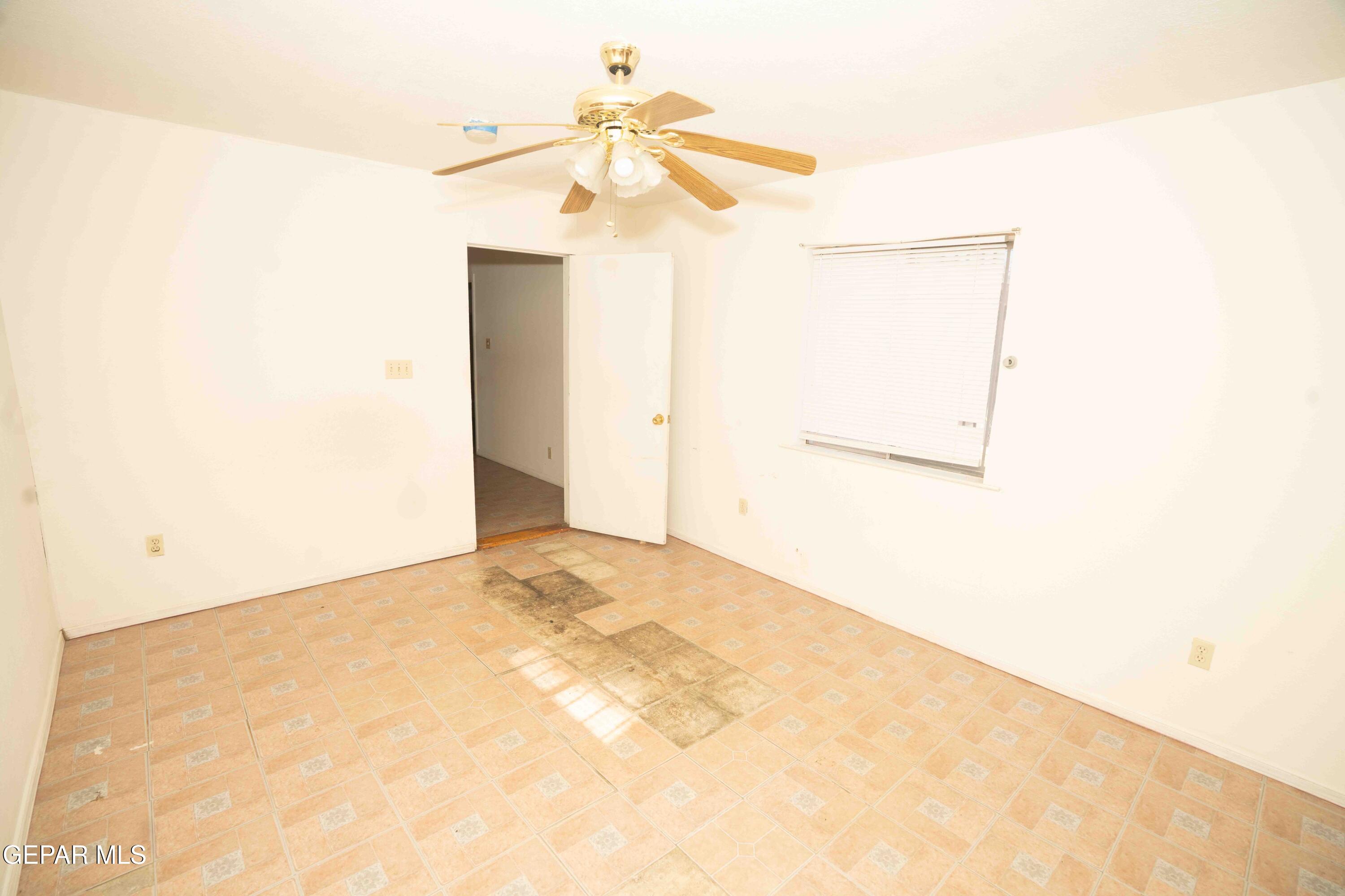 140 Teakwood Road El Paso, TX 79915 - Photo 13 of 16 a view of a room with a ceiling fan