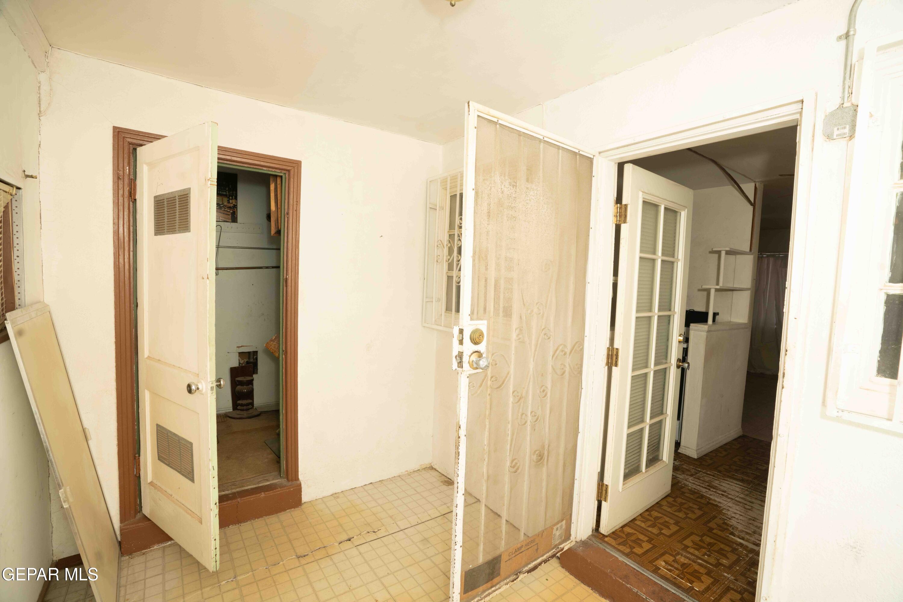 140 Teakwood Road El Paso, TX 79915 - Photo 14 of 16 a view of a hallway with wooden floor and a livingroom