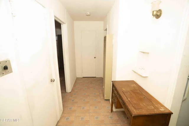 a view of a big room with carpet