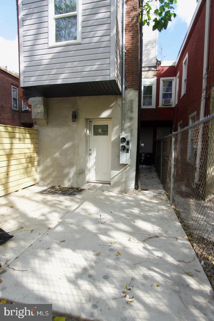 630 Brooklyn Street, Unit 1 Philadelphia, PA 19104 - Photo 7 of 7 a view of a house with a patio