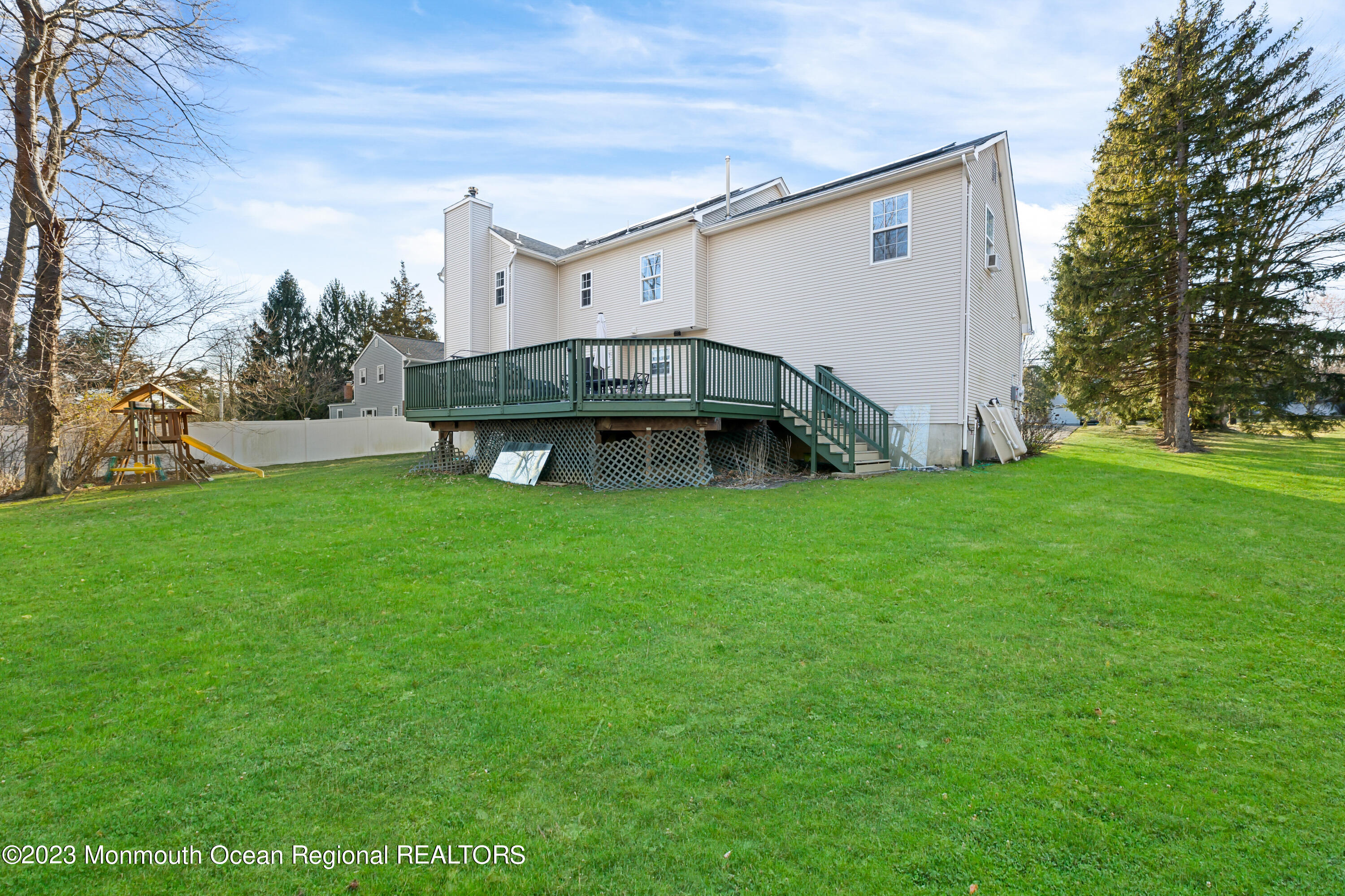 33 Morganville Road Matawan, NJ 07747 - Photo 30 of 41 a view of a house with a yard porch and sitting area