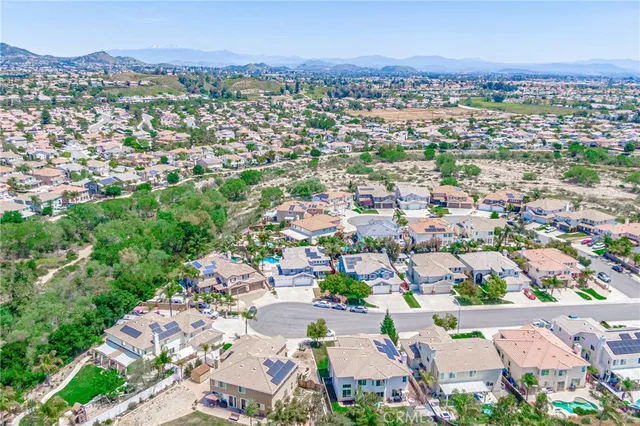 an aerial view of a city with lots of residential buildings