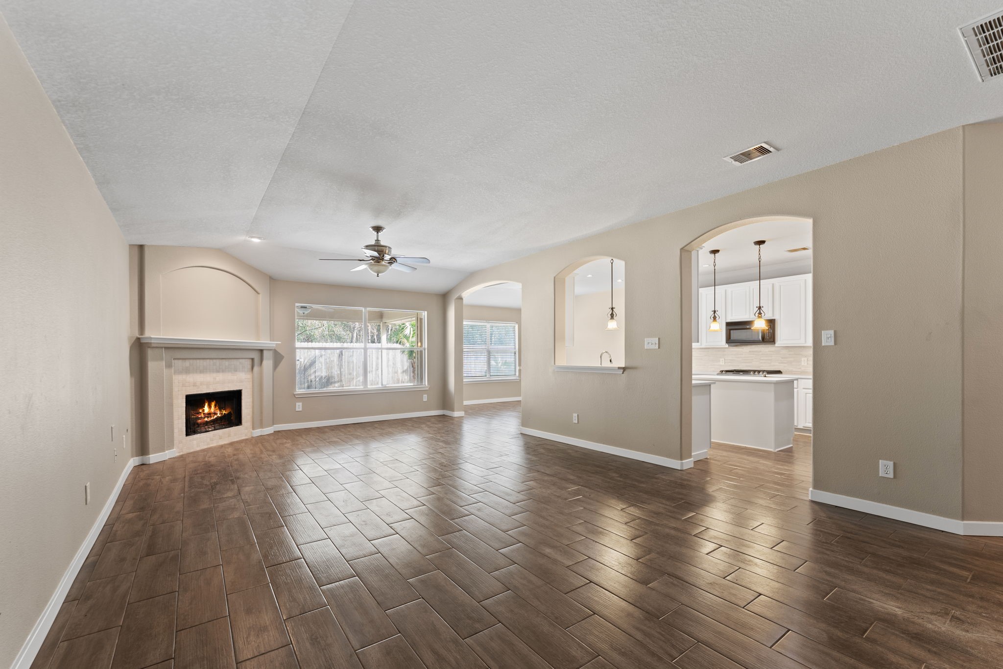 21146 Terrace Vine Lane Spring, TX 77379 - Photo 25 of 38 The family room opens to the kitchen and breakfast area