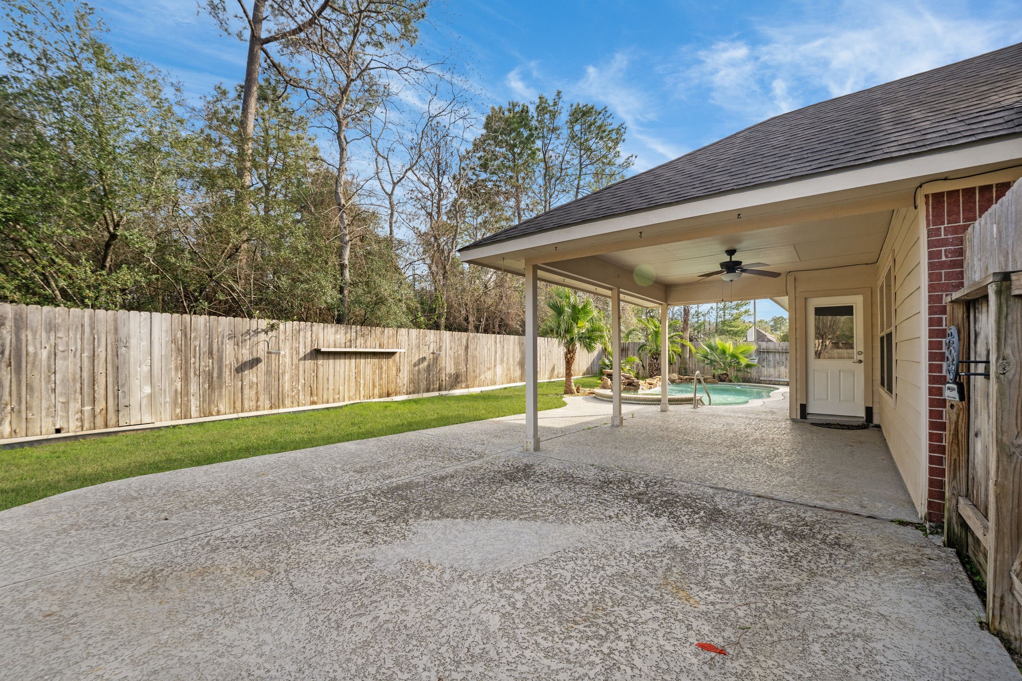 21146 Terrace Vine Lane Spring, TX 77379 - Photo 32 of 38 Oversized deck/patio for the sunlovers or lounging in the shade