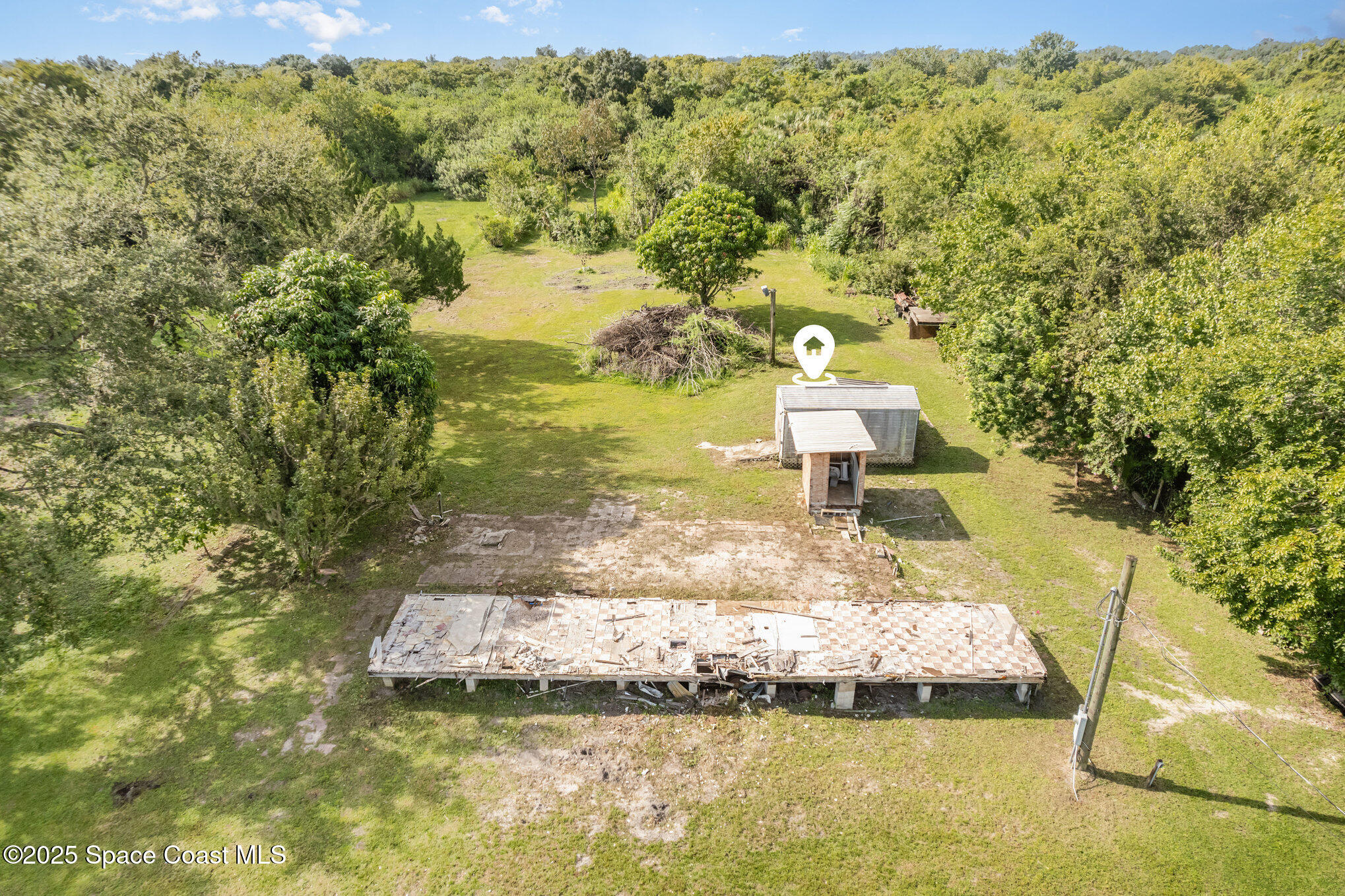 2585 Wiley Avenue Mims, FL 32754 - Photo 8 of 9 a view of a garden with an outdoor space