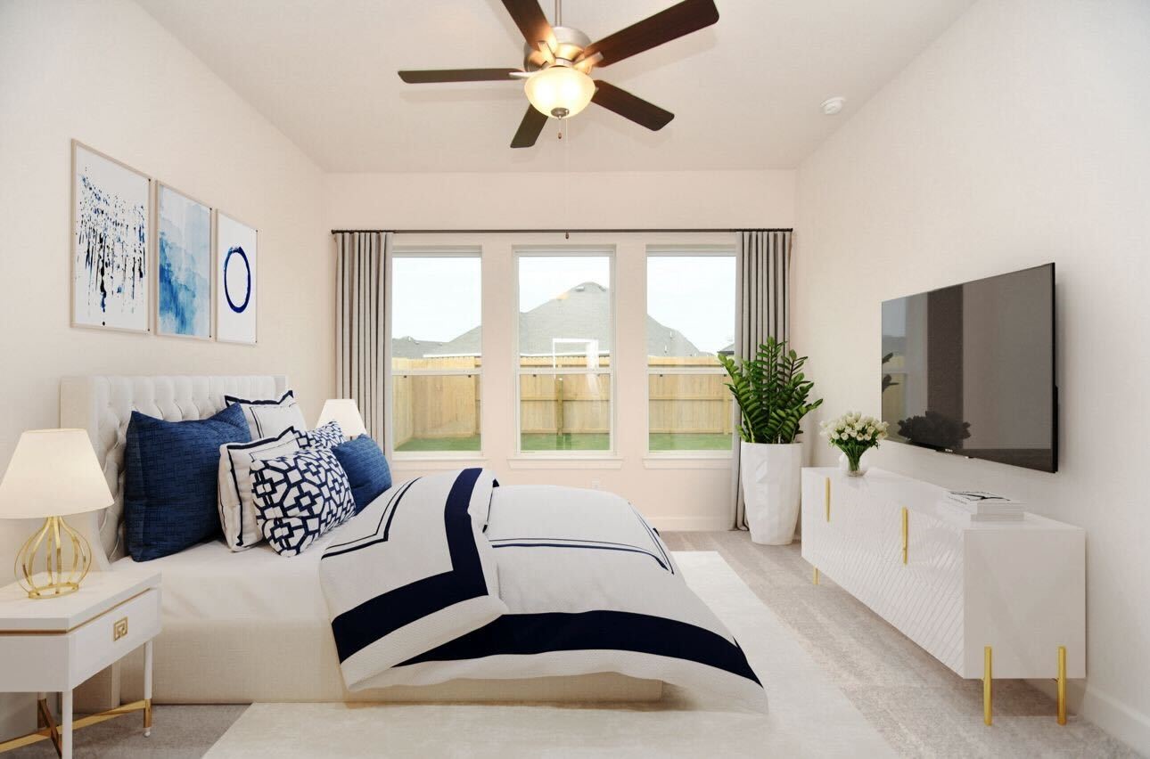 146 Amaranth Way Richmond, TX 77406 - Photo 10 of 18 a living room with furniture fireplace and a flat screen tv