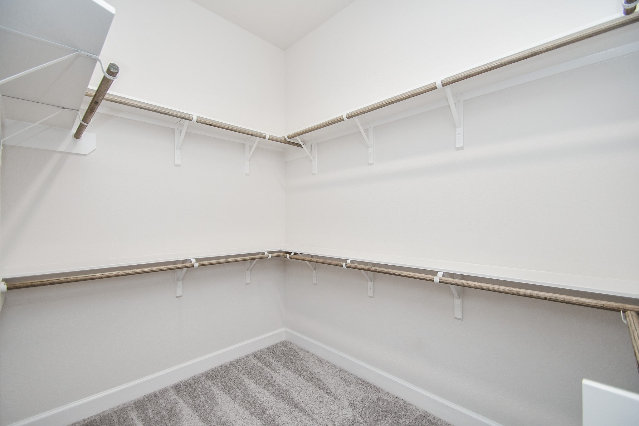 146 Amaranth Way Richmond, TX 77406 - Photo 11 of 18 a view of an empty walk in closet