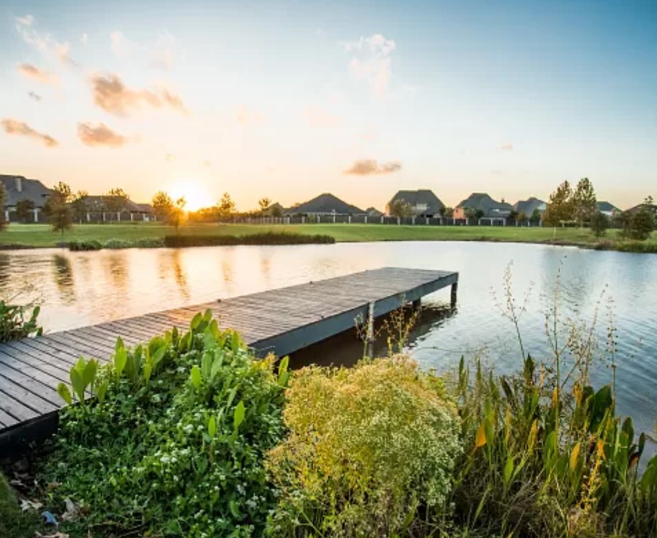 146 Amaranth Way Richmond, TX 77406 - Photo 17 of 18 a view of a lake with a mountain in the background