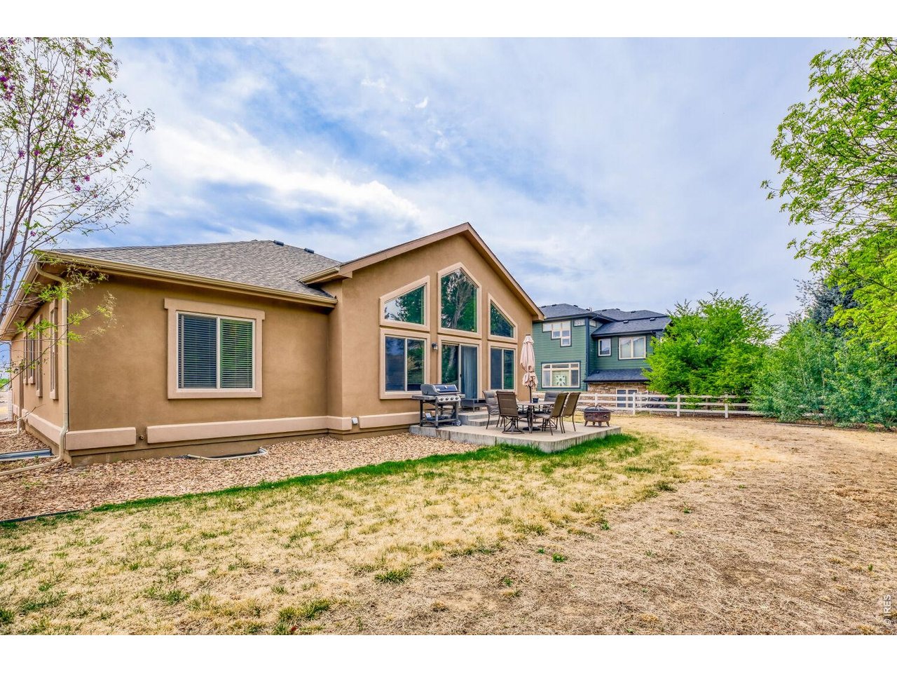 7992 St Street Frederick, CO 80530 - Photo 26 of 28 a view of a house with pool and sitting area