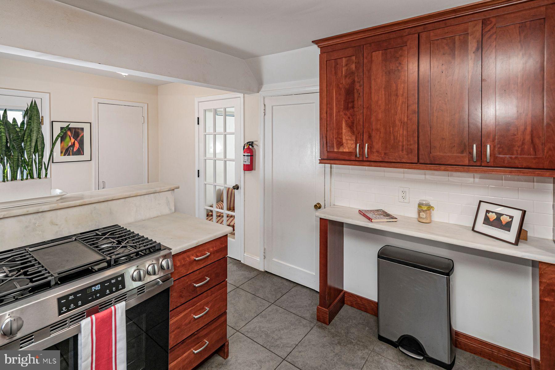 44 Southern Way Princeton, NJ 08540 - Photo 11 of 35 a kitchen with a stove and cabinets