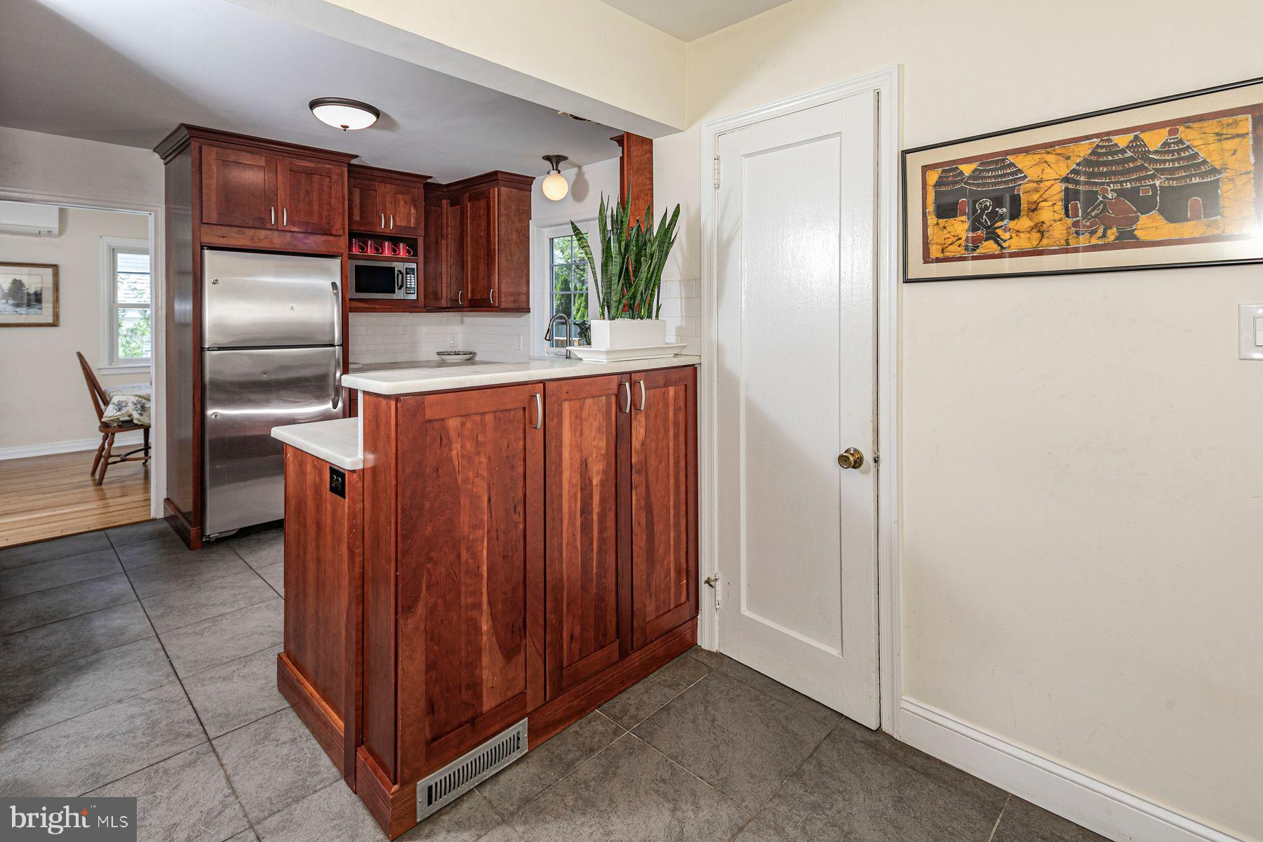 44 Southern Way Princeton, NJ 08540 - Photo 13 of 35 a kitchen with stainless steel appliances granite countertop a refrigerator and a sink