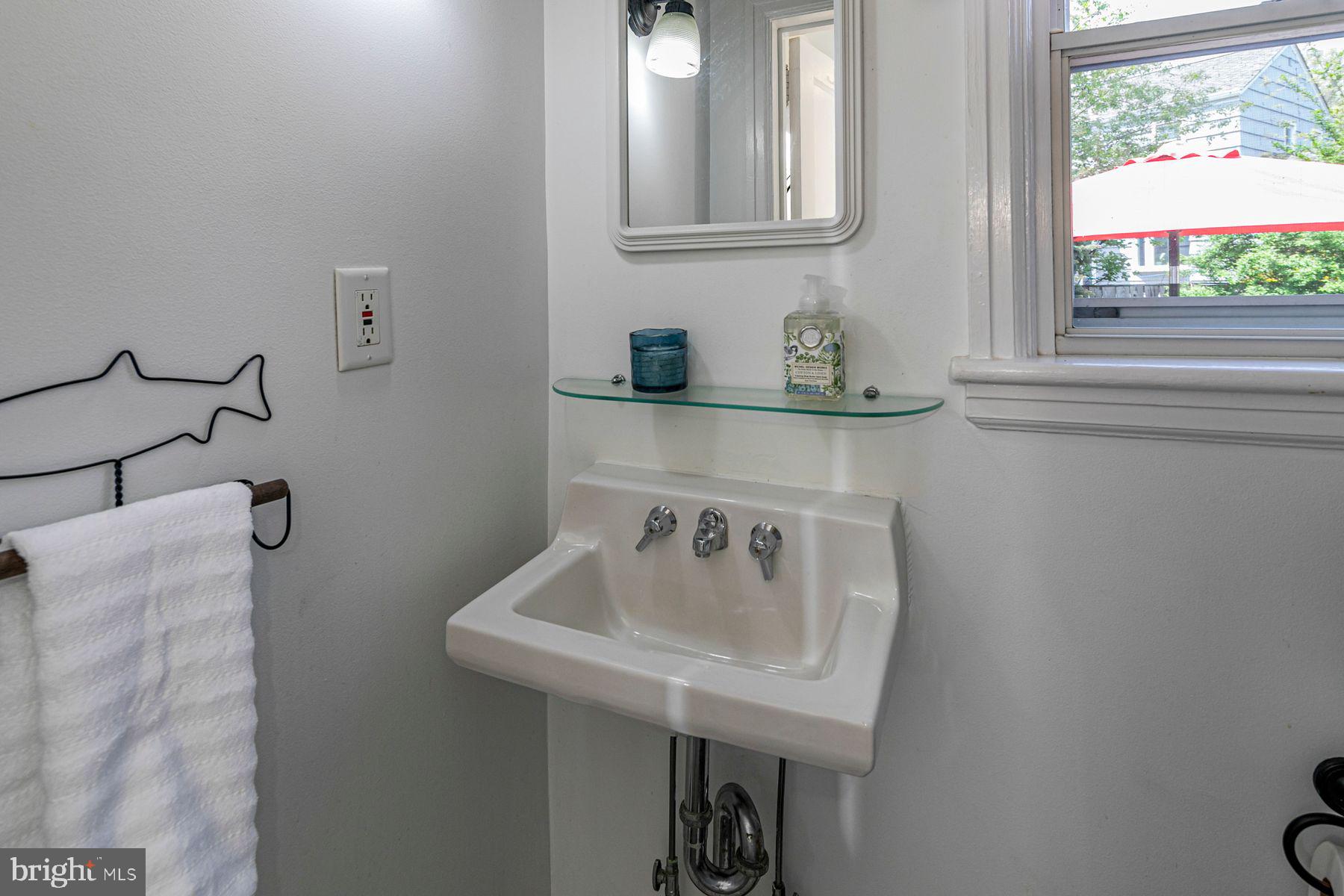 44 Southern Way Princeton, NJ 08540 - Photo 14 of 35 a bathroom with a sink and a window