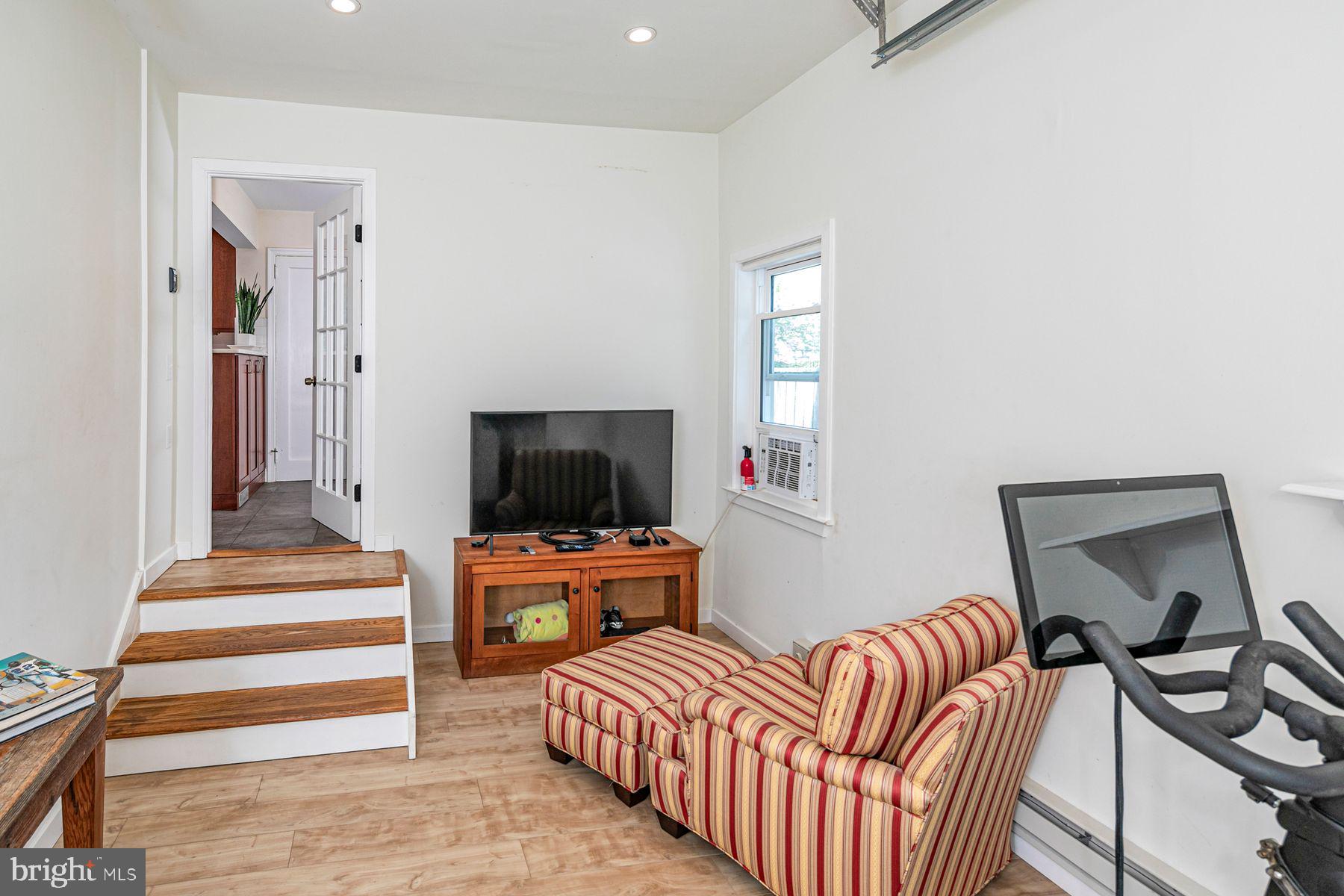 44 Southern Way Princeton, NJ 08540 - Photo 15 of 35 a bedroom with furniture and a flat screen tv