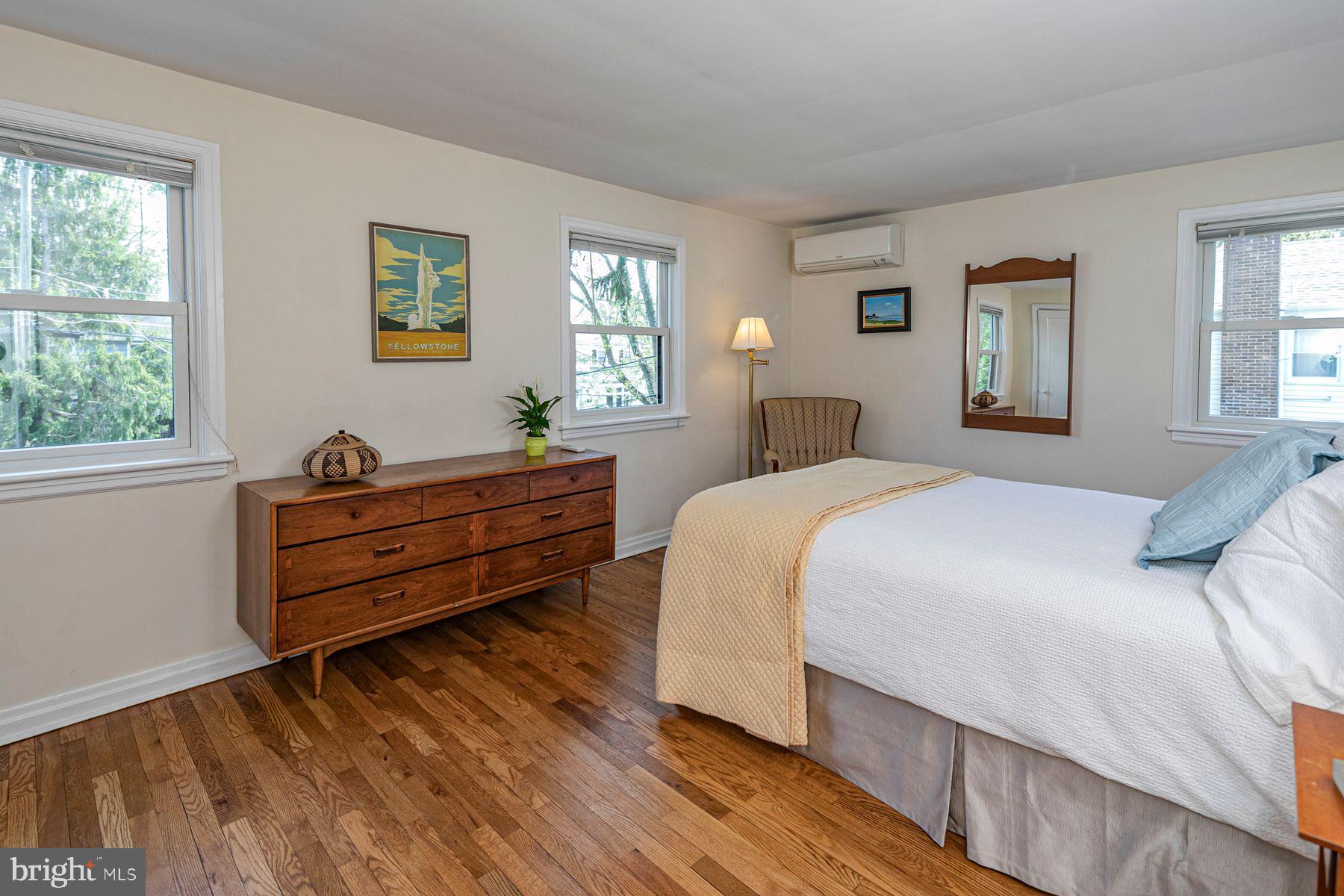 44 Southern Way Princeton, NJ 08540 - Photo 19 of 35 a bedroom with a bed and wooden floor