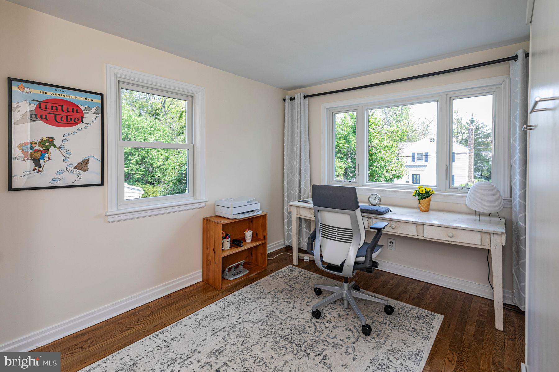 44 Southern Way Princeton, NJ 08540 - Photo 22 of 35 a view of a workspace with furniture and a window